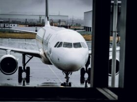 a large jetliner sitting on top of an airport tarmac