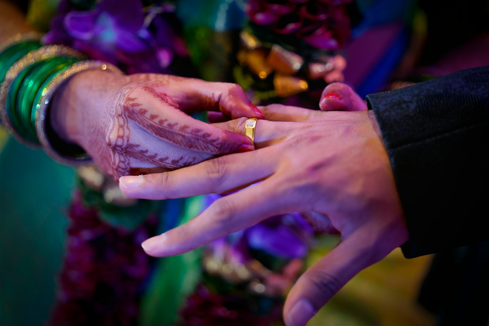 person with gold ring and gold ring